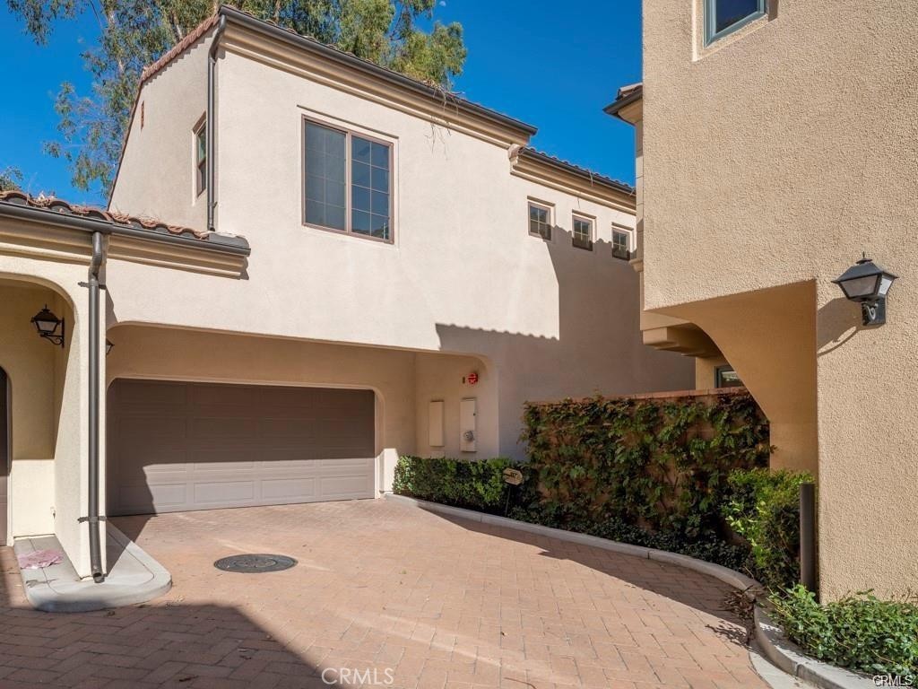 116 Firefly Irvine, CA 92618 - Photo 15 of 16 a front view of a house with a yard