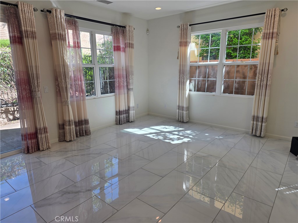 116 Firefly Irvine, CA 92618 - Photo 2 of 16 a view of an empty room with windows