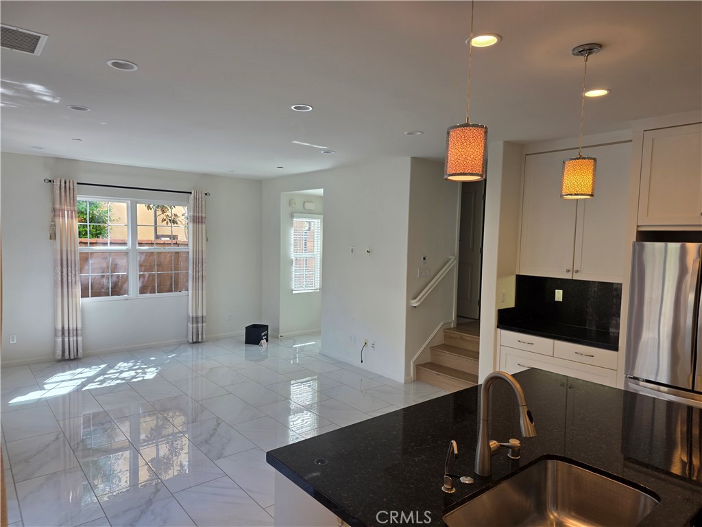 116 Firefly Irvine, CA 92618 - Photo 4 of 16 a view of a room with gym equipment