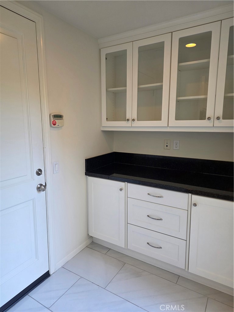 116 Firefly Irvine, CA 92618 - Photo 6 of 16 a bathroom with a sink and a mirror