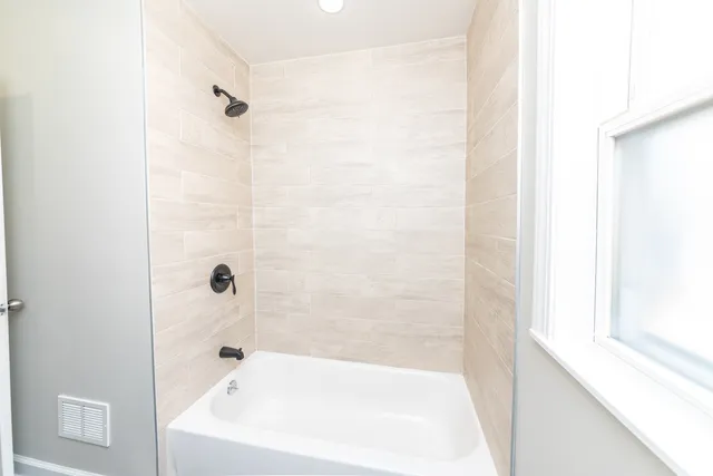 a bathroom with a bathtub