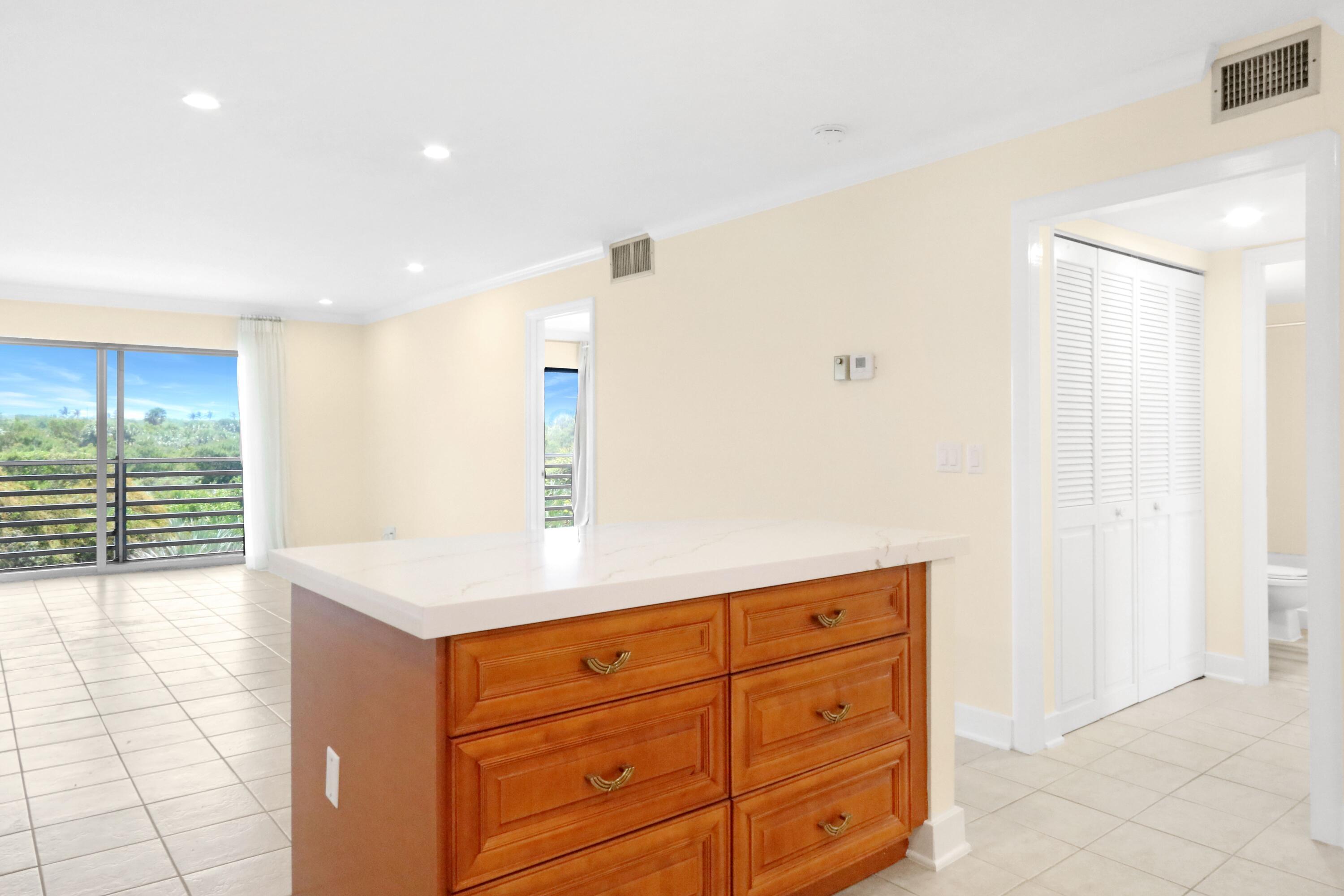 717 Highway 1, Unit 712 Jupiter, FL 33477 - Photo 15 of 30 View from Kitchen into guest bath