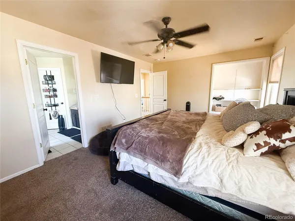 a kitchen with stainless steel appliances a refrigerator and a stove