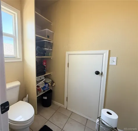 a room with furniture and a window