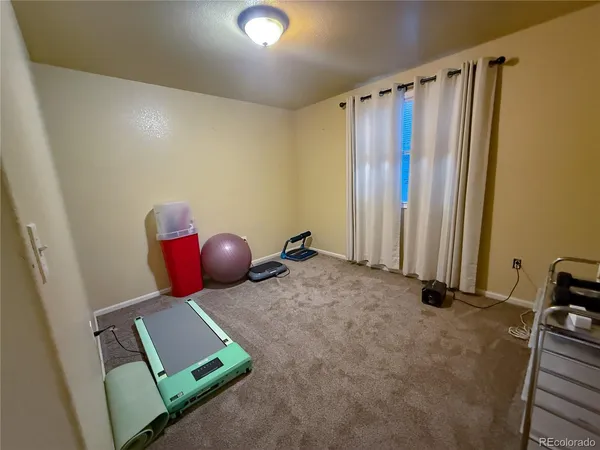 a room with furniture and toys