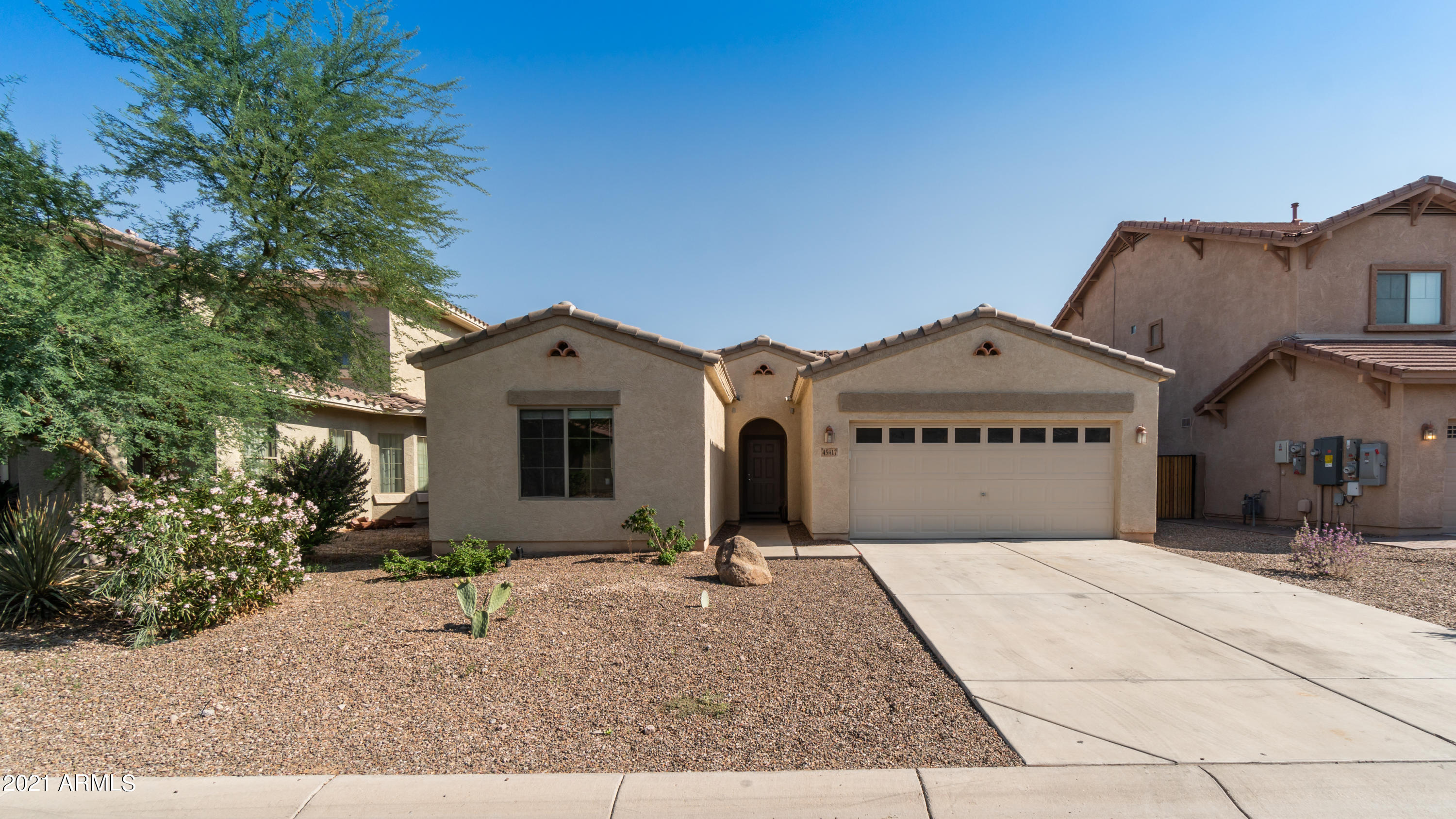 45417 West Zion Road Maricopa, AZ 85139 - Photo 2 of 31 a house with trees in front of it