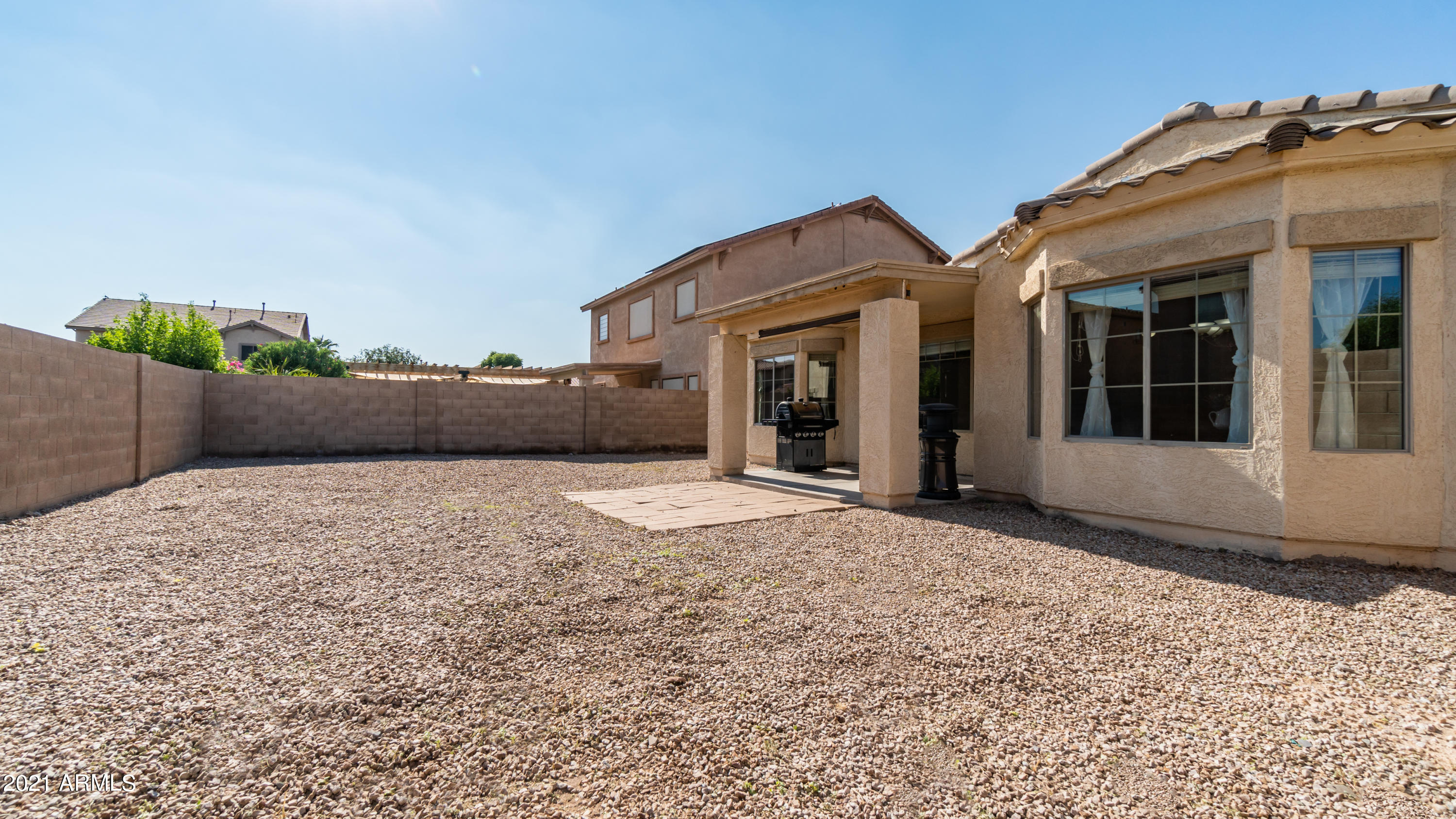 45417 West Zion Road Maricopa, AZ 85139 - Photo 30 of 31 a front view of a house with a yard
