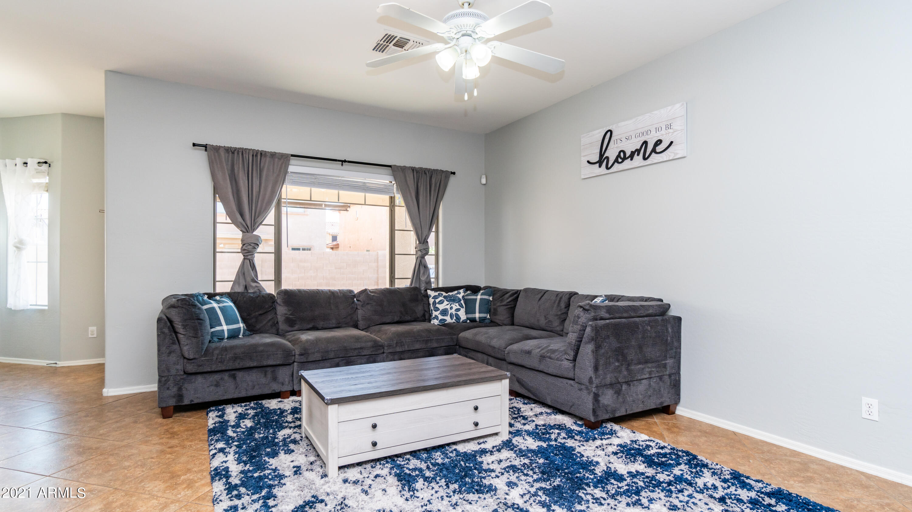 45417 West Zion Road Maricopa, AZ 85139 - Photo 6 of 31 a living room with furniture and a window