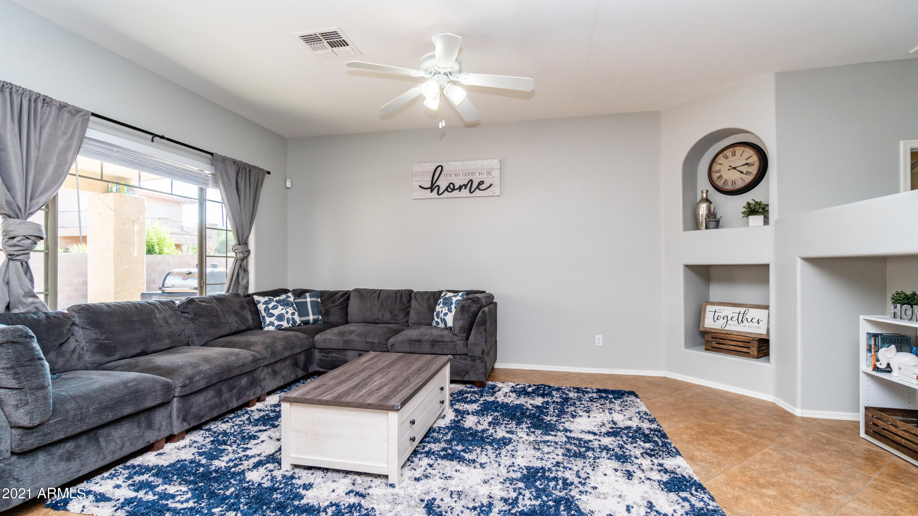 45417 West Zion Road Maricopa, AZ 85139 - Photo 7 of 31 a living room with furniture and a window