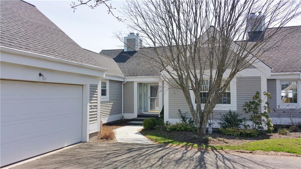 258 Legend Hill Road, Unit 258 Madison, CT 06443 - Photo 1 of 1 a front view of a house with a yard