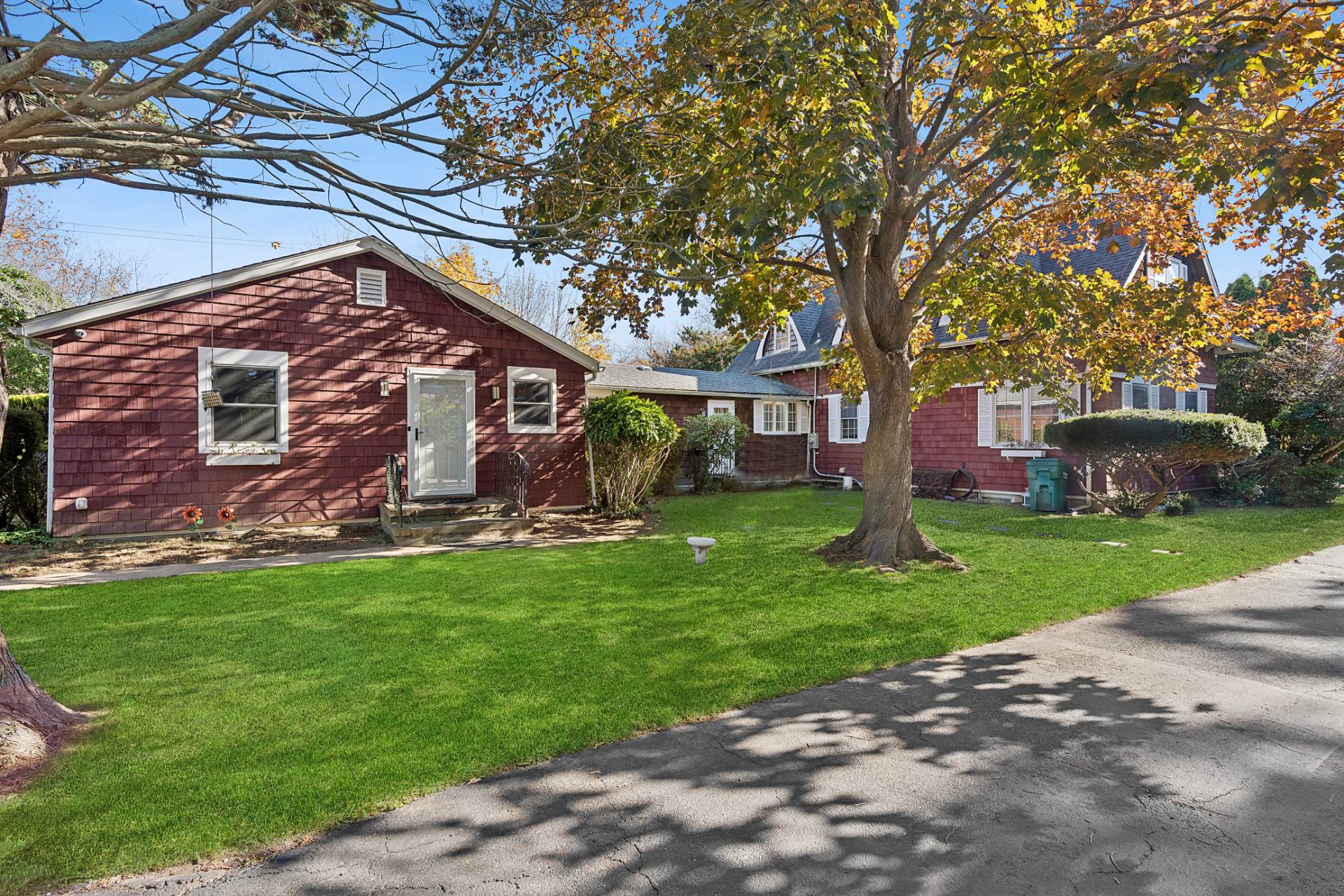 201 Herrick Road Southampton, NY 11968 - Photo 24 of 29 a front view of a house with garden