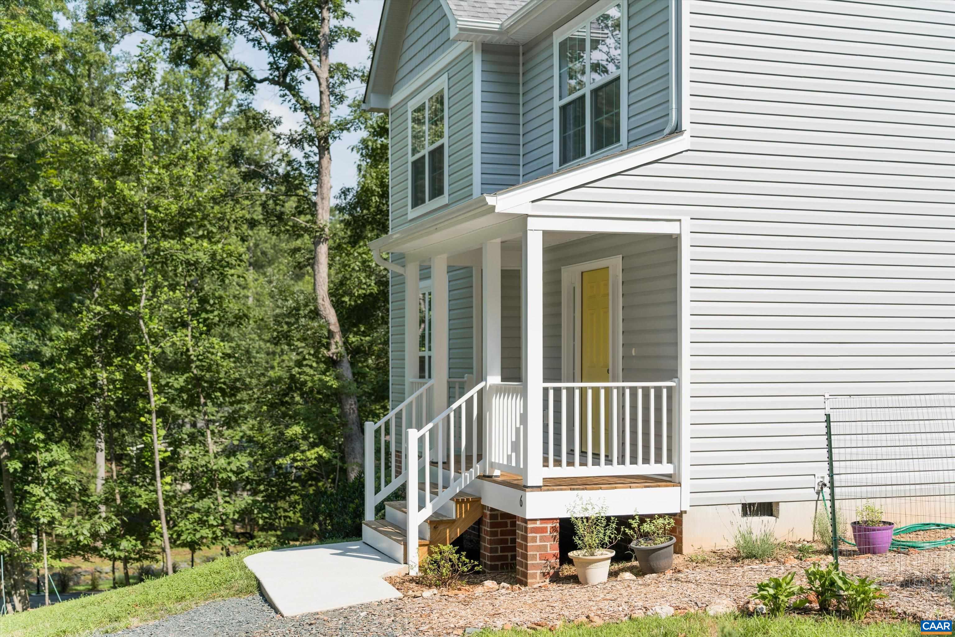 6 Kingswood Road Palmyra, VA 22963 - Photo 18 of 41 a view of a brick house with a large windows