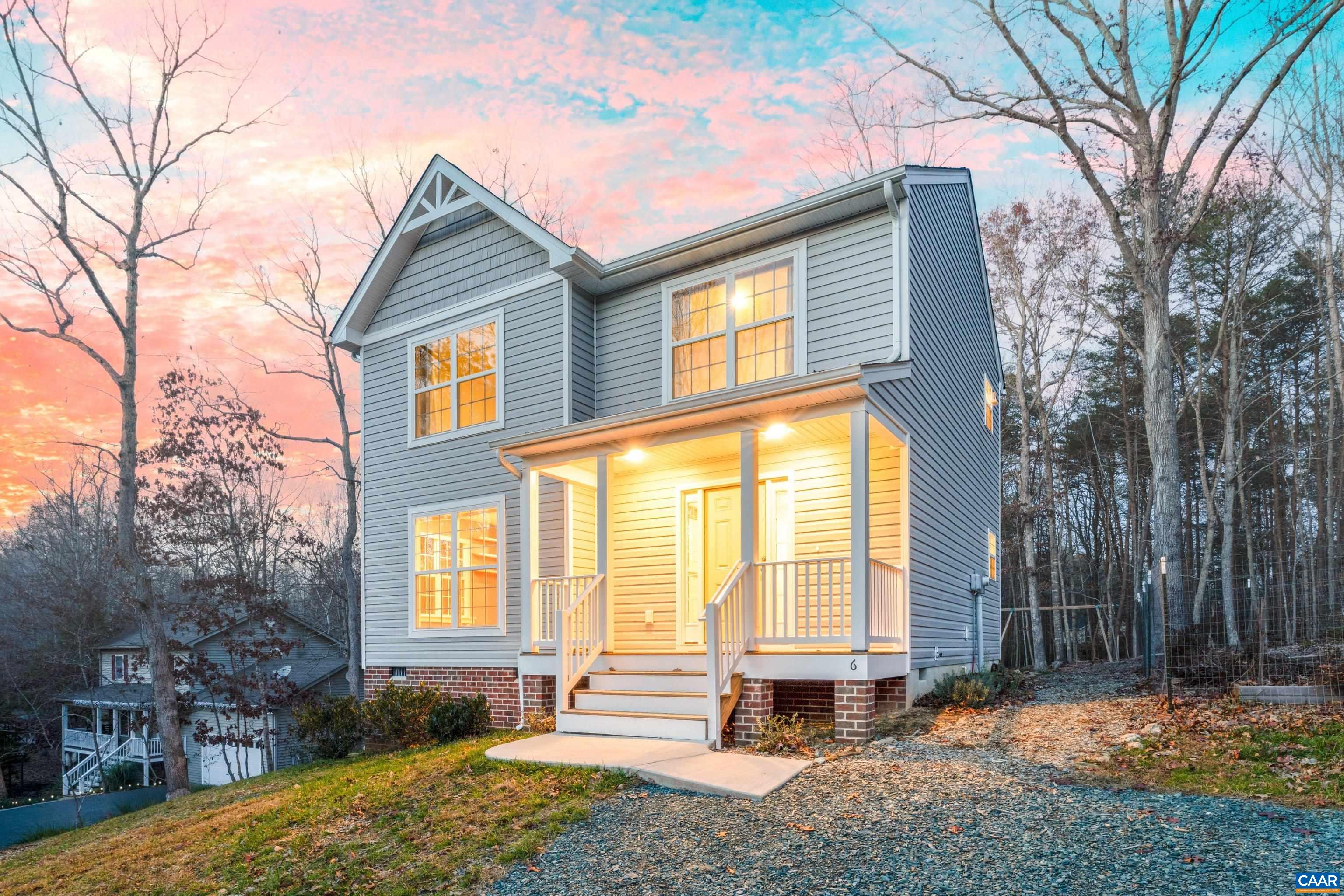 6 Kingswood Road Palmyra, VA 22963 - Photo 2 of 41 a front view of a house with a yard