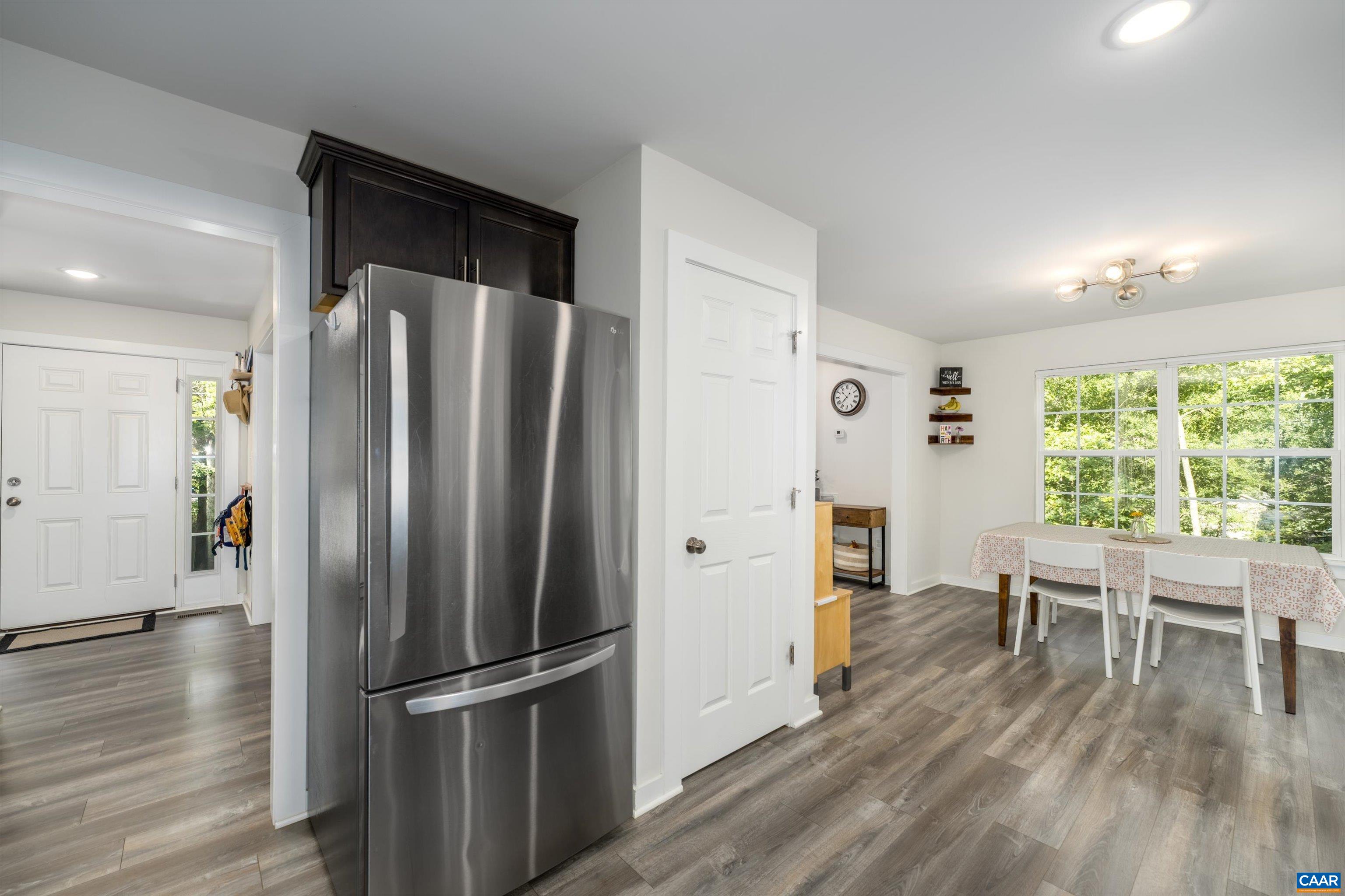 6 Kingswood Road Palmyra, VA 22963 - Photo 21 of 41 a kitchen with stainless steel appliances granite countertop a refrigerator microwave and wooden floor