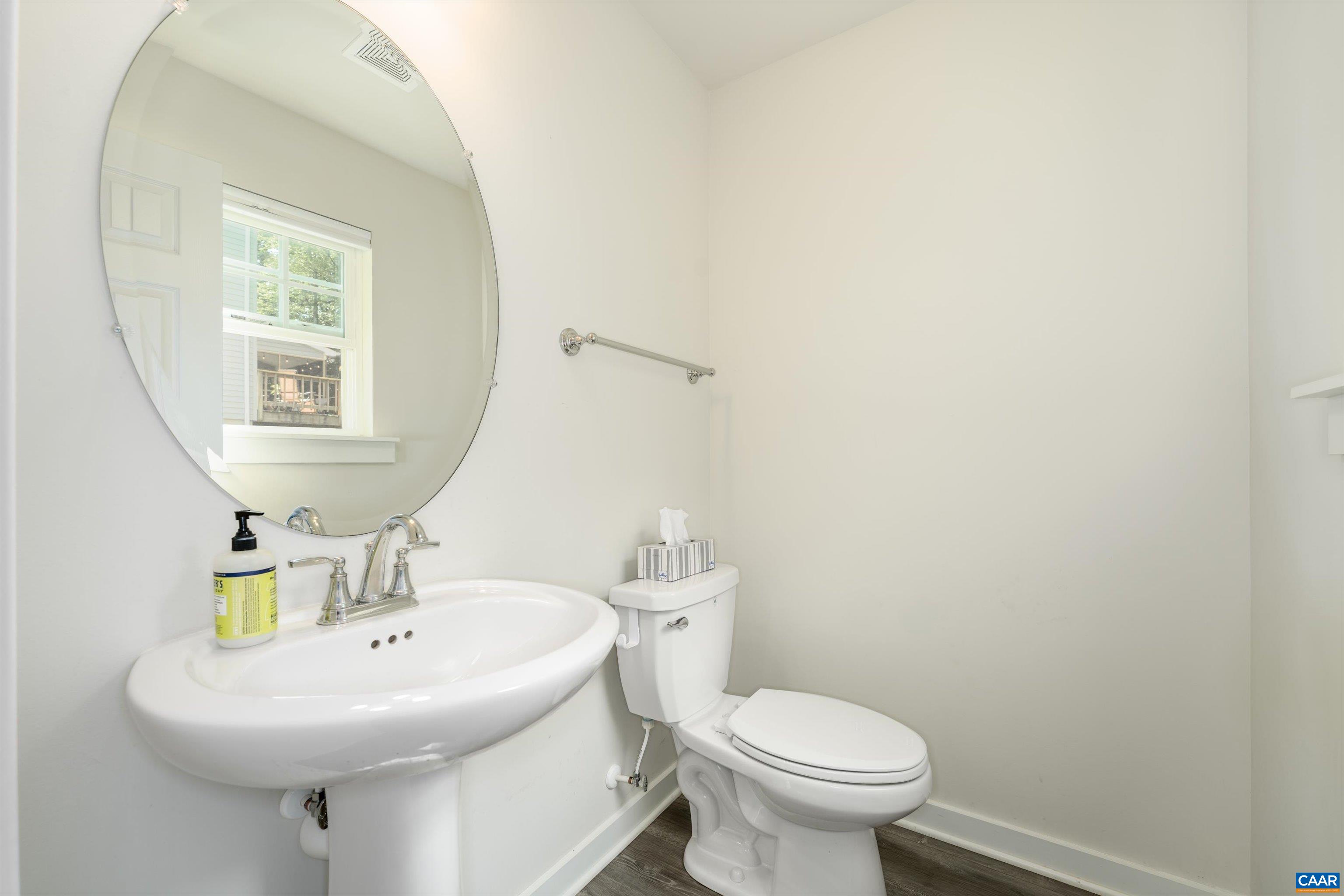 6 Kingswood Road Palmyra, VA 22963 - Photo 24 of 41 a bathroom with a sink a toilet and mirror