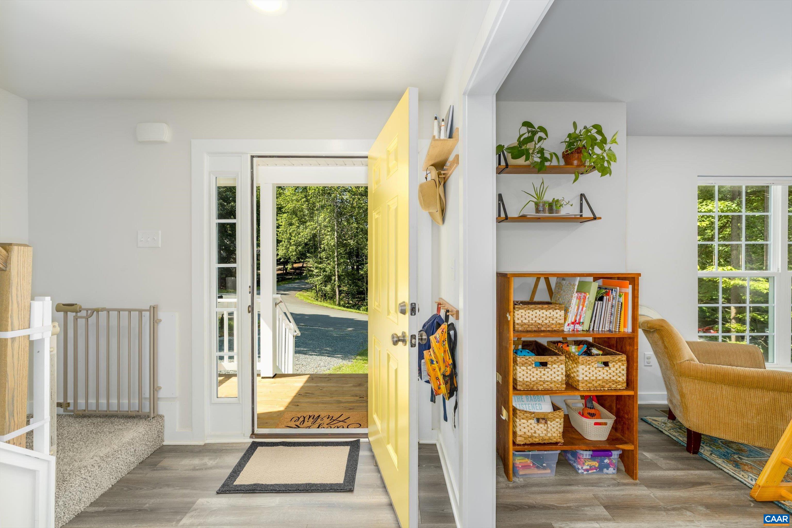 6 Kingswood Road Palmyra, VA 22963 - Photo 8 of 41 a living room with furniture and a floor to ceiling window