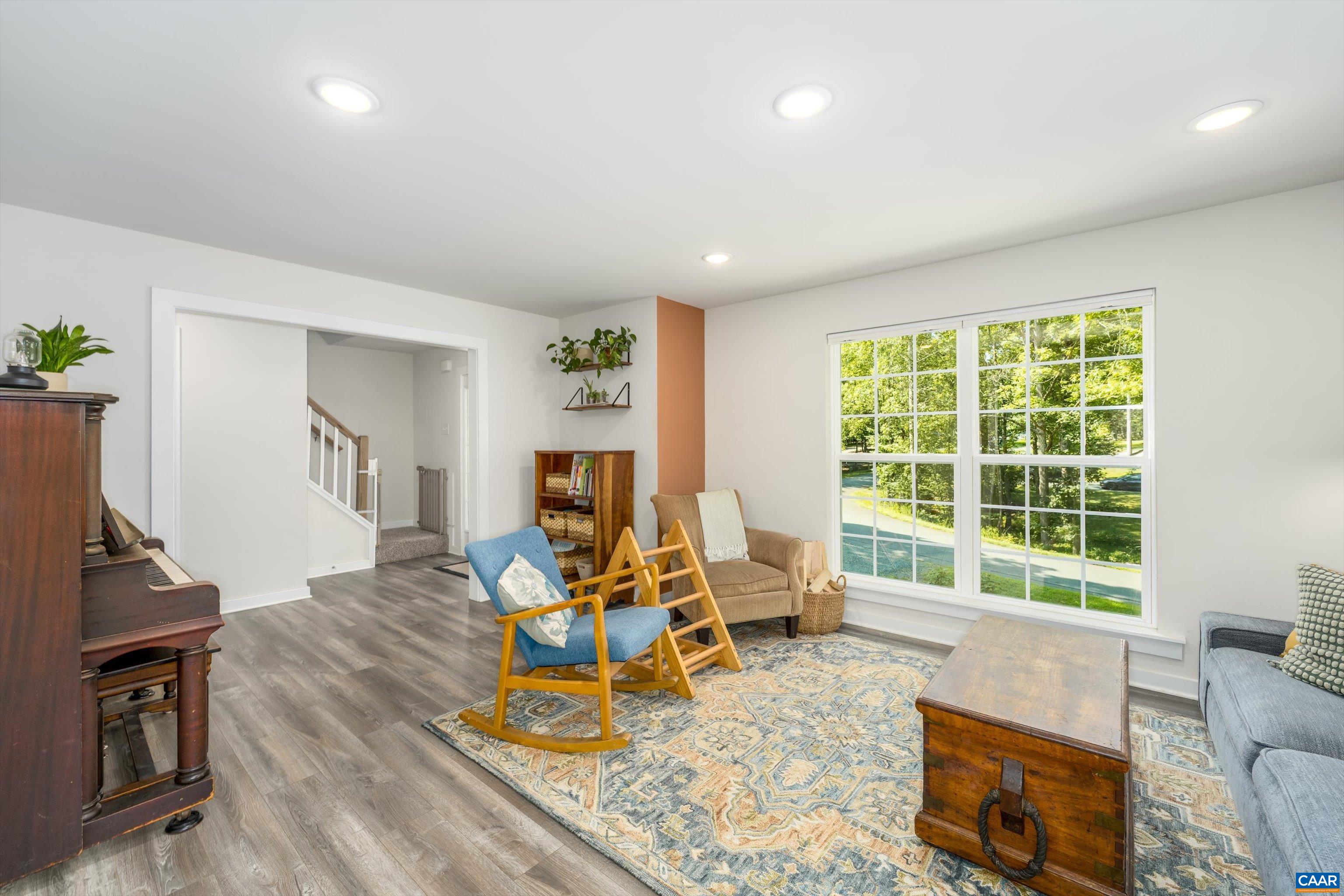 6 Kingswood Road Palmyra, VA 22963 - Photo 9 of 41 a living room with furniture and a flat screen tv