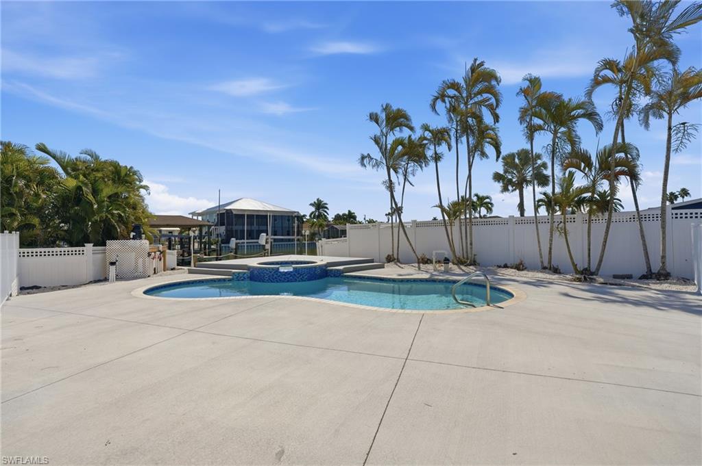 1 Fairview Boulevard Fort Myers Beach, FL 33931 - Photo 24 of 48 a view of outdoor space with trees