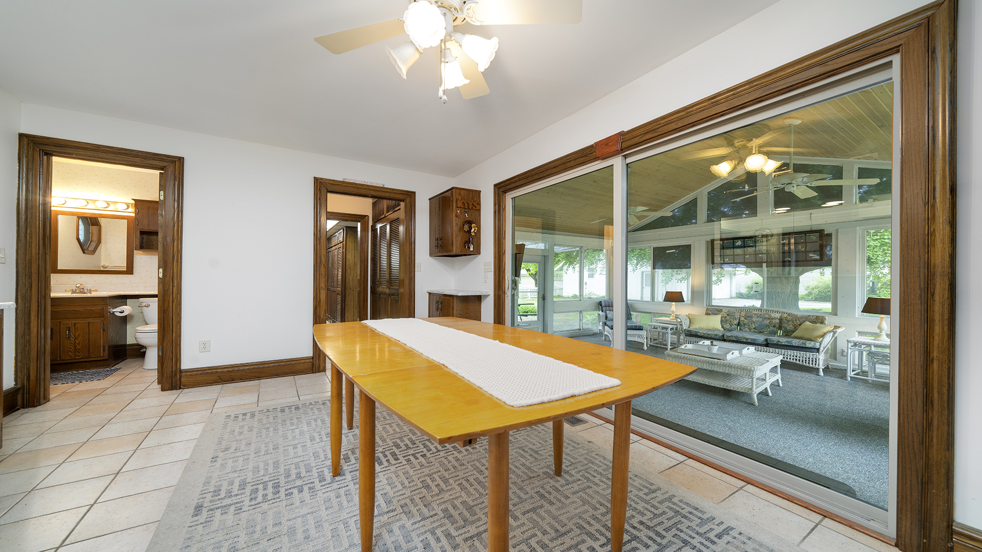 321 East Chamberlin Street Dixon, IL 61021 - Photo 18 of 58 a view of a dining room with furniture wooden floor and a chandelier