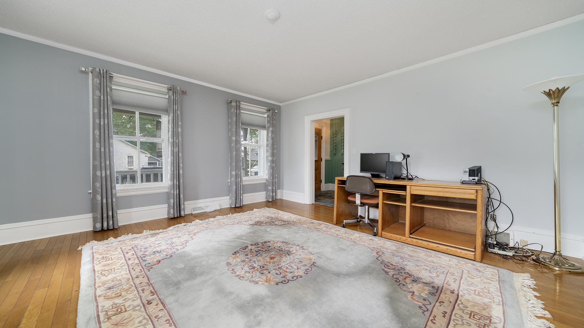 321 East Chamberlin Street Dixon, IL 61021 - Photo 24 of 58 a bedroom with a bed and a view of kitchen