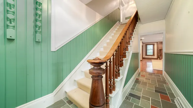 a spacious bedroom with a bed and cabinets