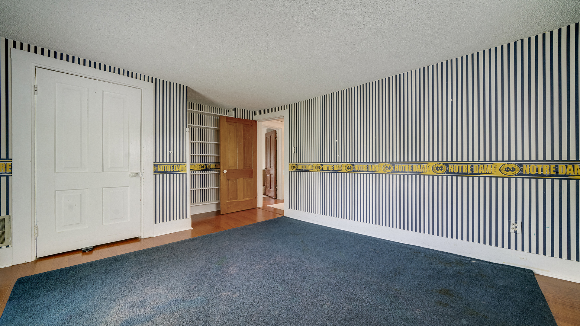 321 East Chamberlin Street Dixon, IL 61021 - Photo 38 of 58 a view of an empty room with wooden floor