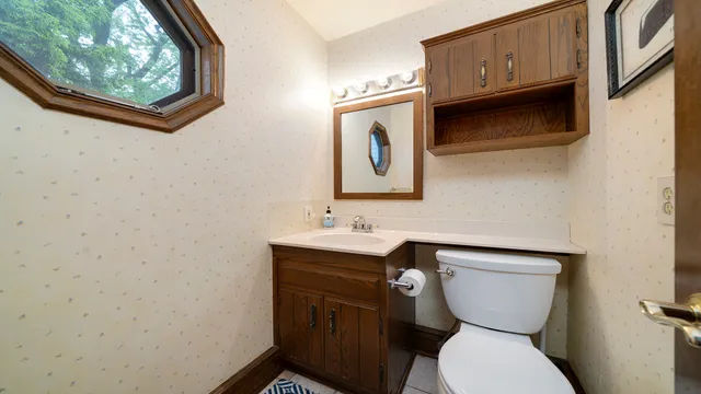 a view of empty room with wooden ceiling