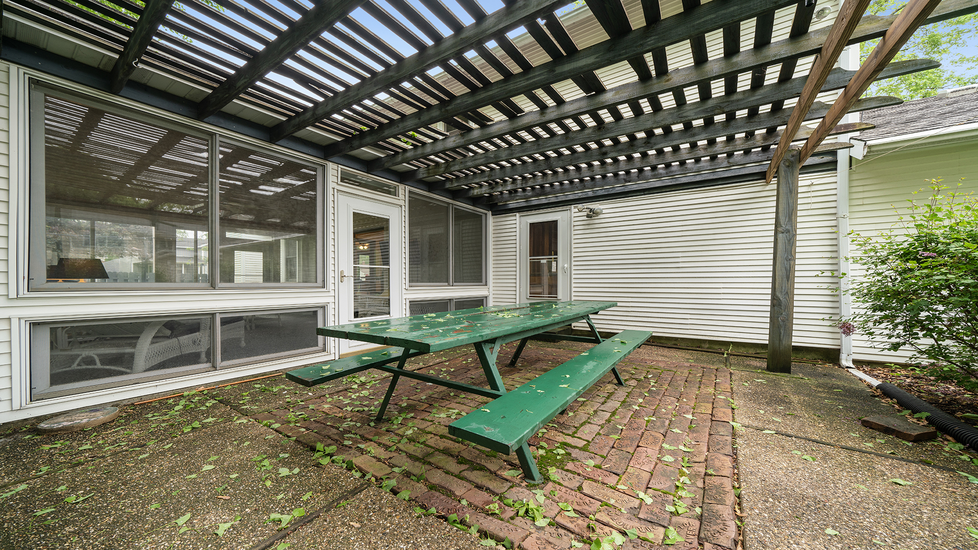 321 East Chamberlin Street Dixon, IL 61021 - Photo 44 of 58 a view of house with chairs and wooden fence