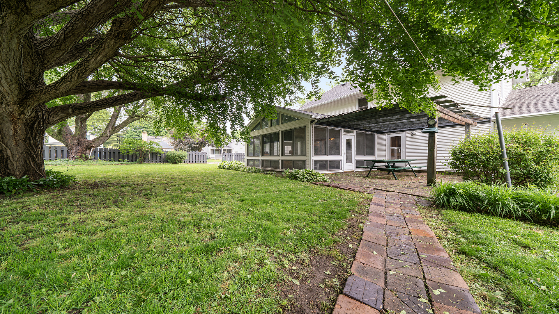 321 East Chamberlin Street Dixon, IL 61021 - Photo 46 of 58 a front view of a house with yard and green space