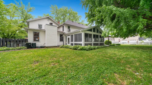 a view of a porch with wooden floor and outdoor space