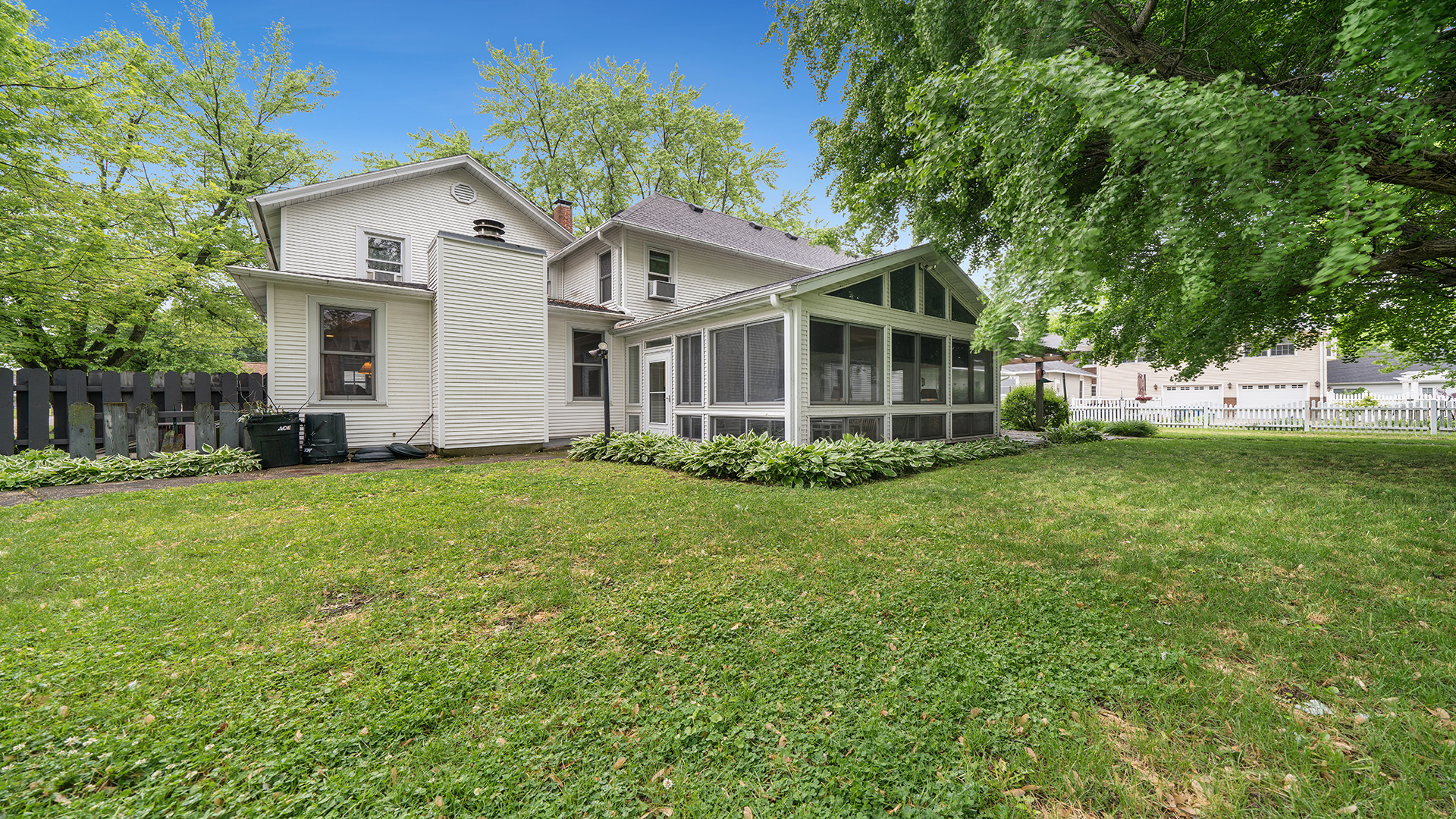 321 East Chamberlin Street Dixon, IL 61021 - Photo 47 of 58 a front view of house with yard and green space