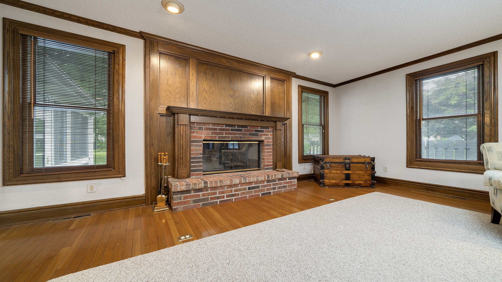 321 East Chamberlin Street Dixon, IL 61021 - Photo 8 of 58 a living room with fireplace furniture and a large window