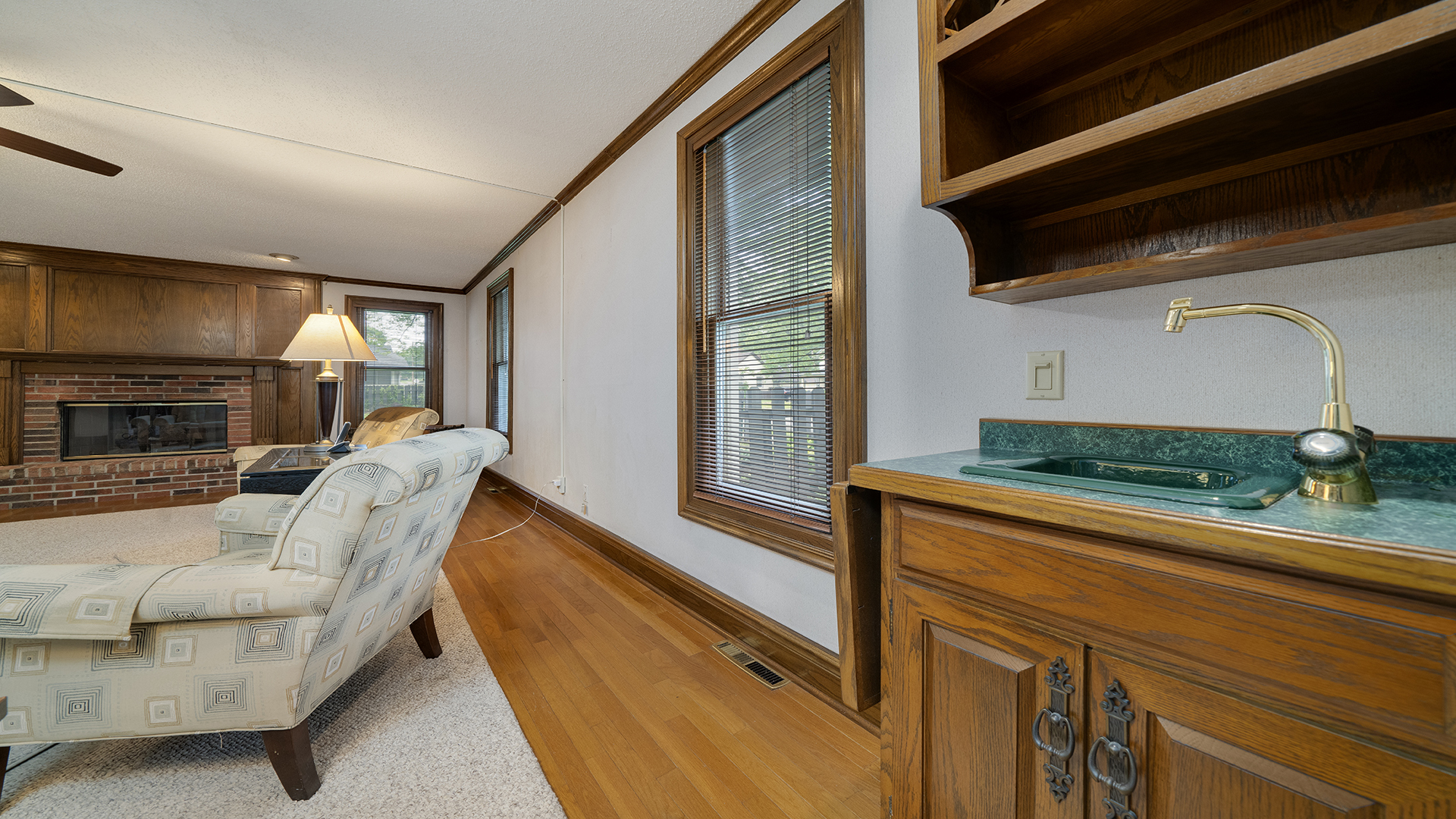 321 East Chamberlin Street Dixon, IL 61021 - Photo 10 of 58 a living room with furniture fireplace and flat screen tv
