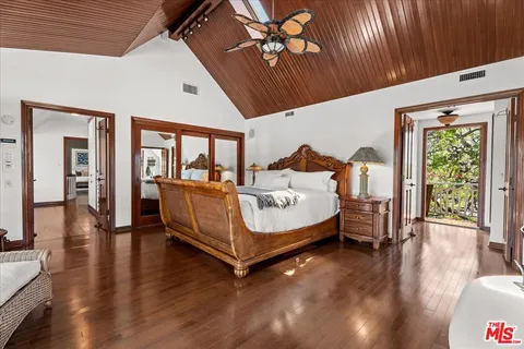 a bedroom with furniture and window