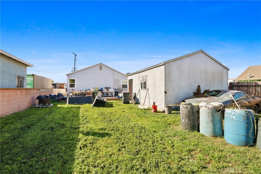 229 East Reeve Street Compton, CA 90220 - Photo 8 of 11 a house view with a garden space