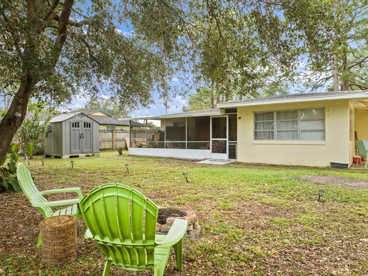 7202 Donlon Road Fort Pierce, FL 34951 - Photo 17 of 33 a view of a house with pool and sitting area