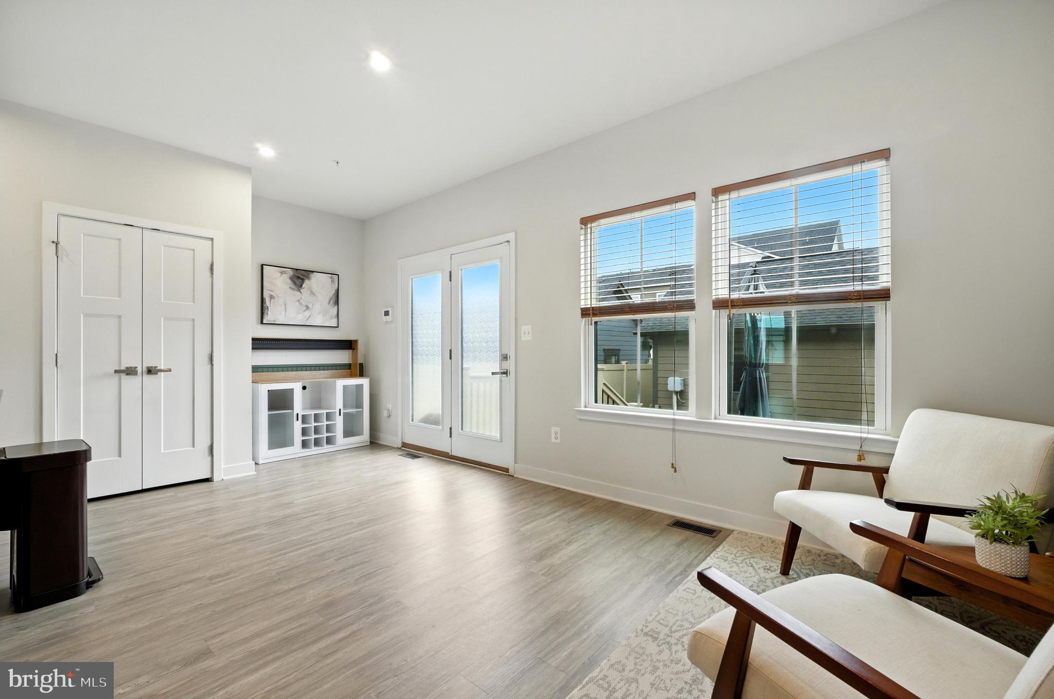 6412 Dalston Street Middle River, MD 21220 - Photo 23 of 53 a living room with furniture and a large window