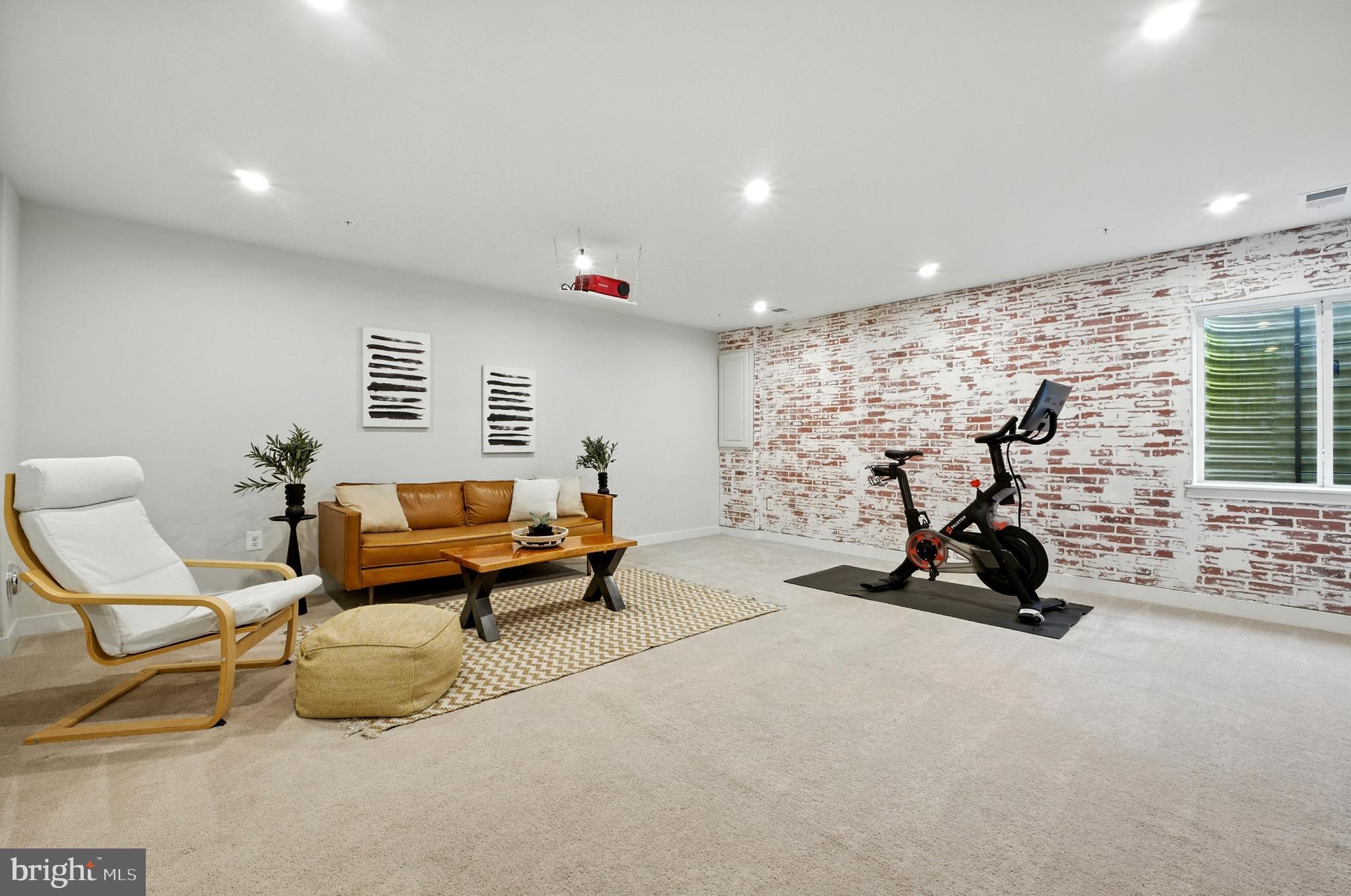 6412 Dalston Street Middle River, MD 21220 - Photo 26 of 53 a living room with furniture gym equipment and a view of living room