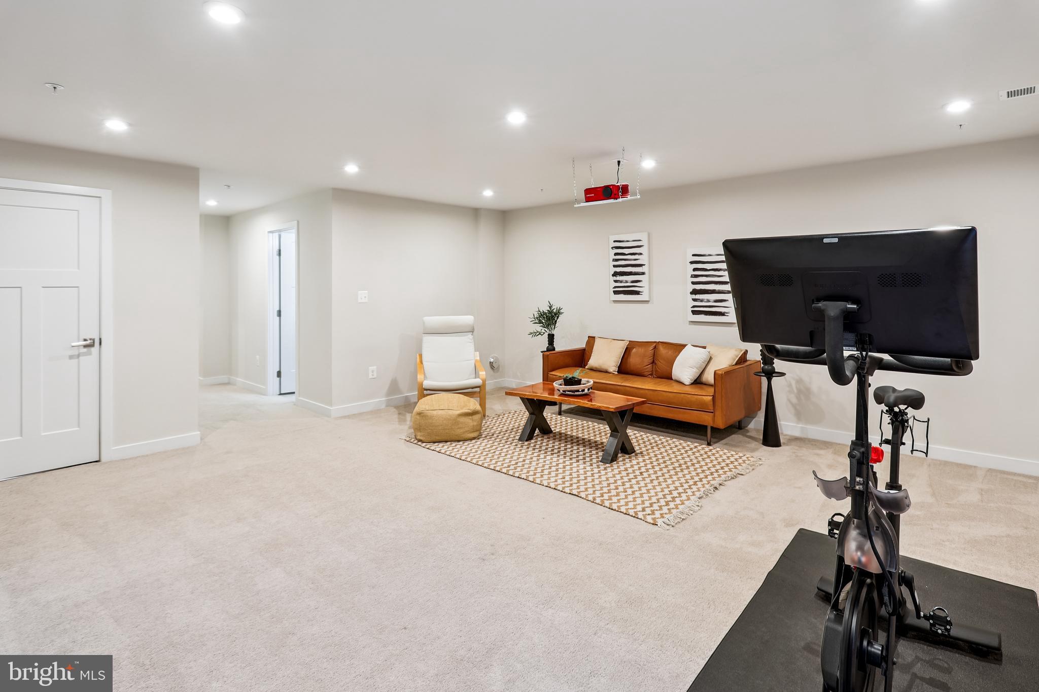 6412 Dalston Street Middle River, MD 21220 - Photo 27 of 53 a living room with furniture and a flat screen tv