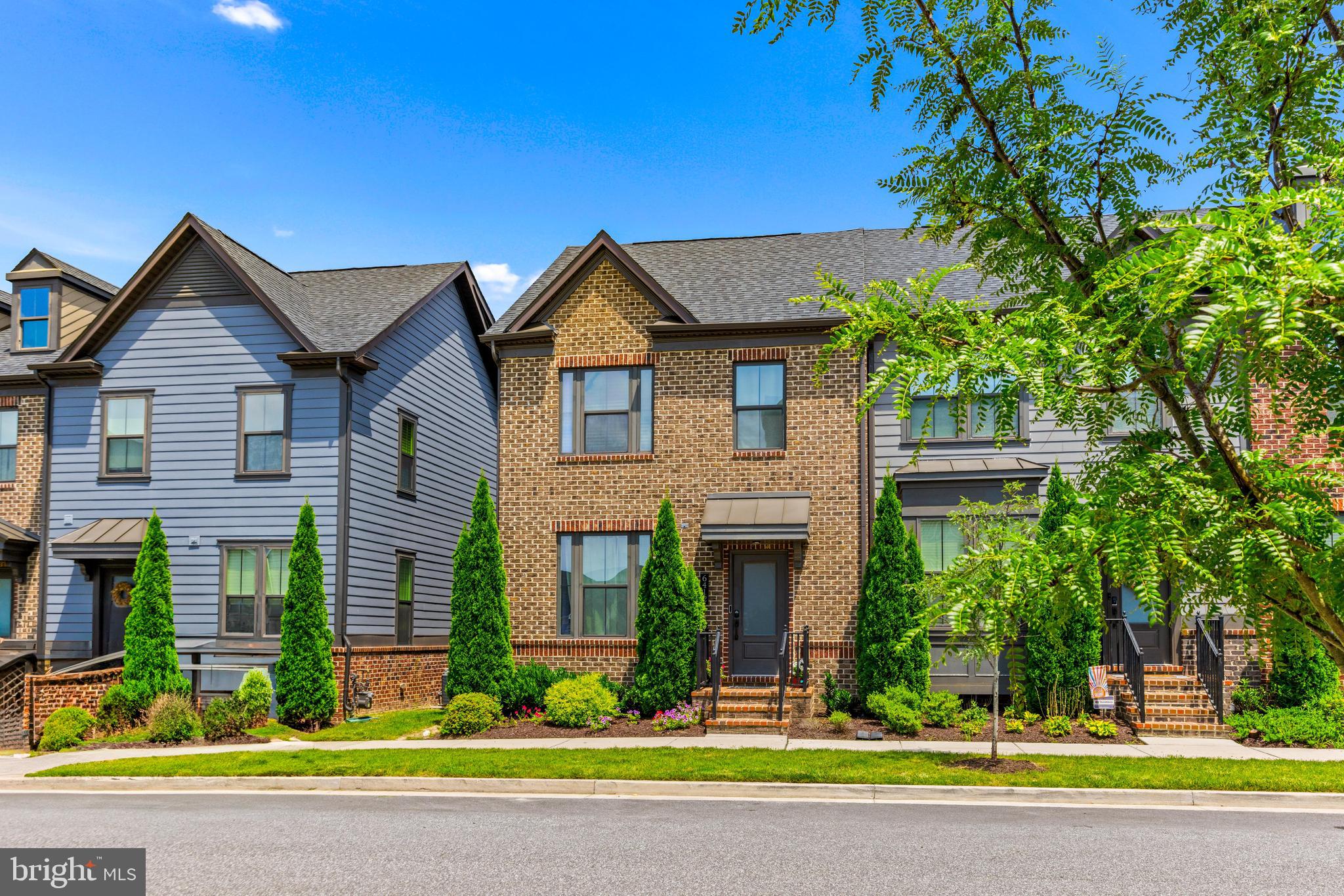 6412 Dalston Street Middle River, MD 21220 - Photo 3 of 53 a front view of a house with a yard and potted plants
