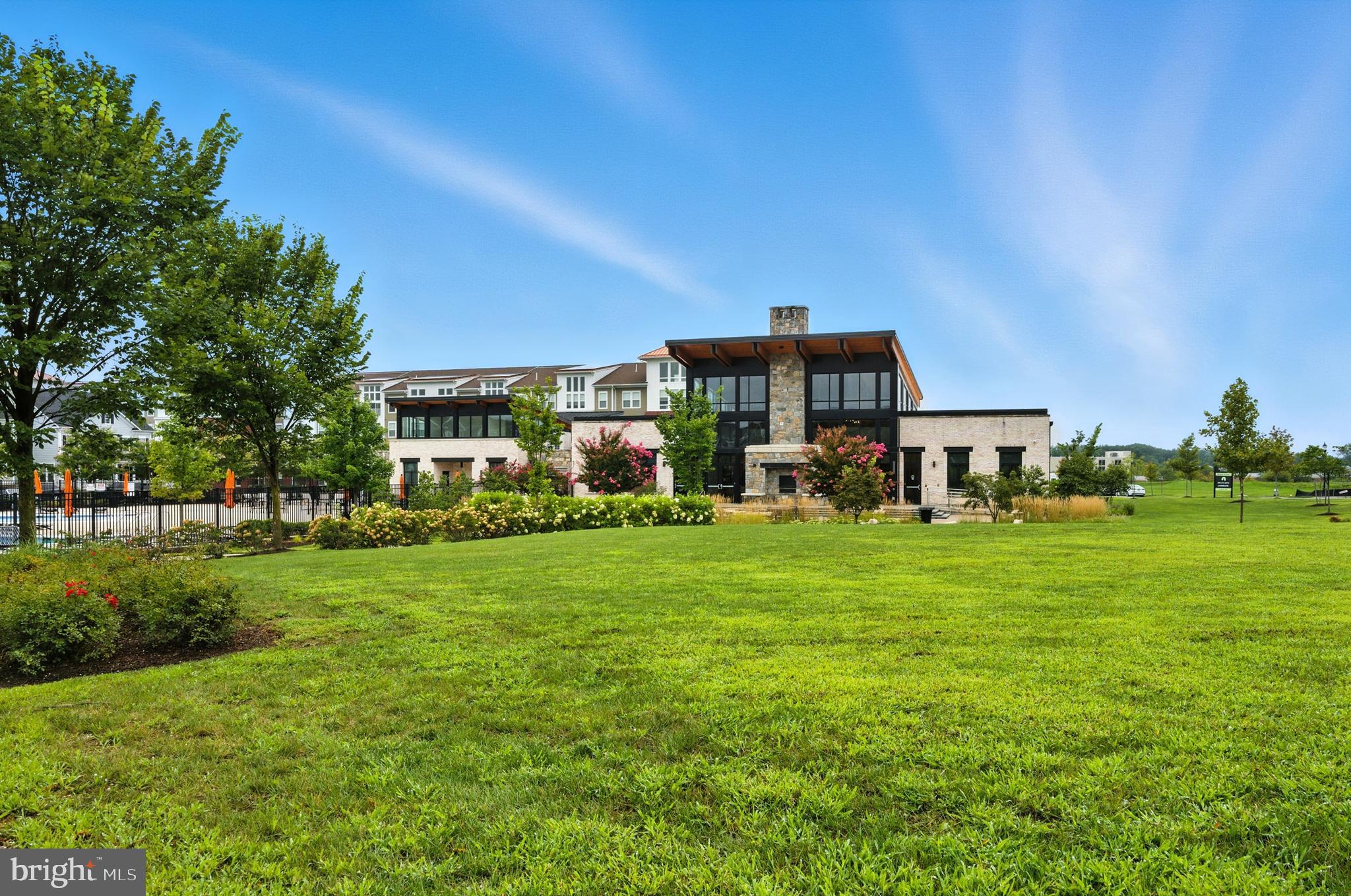 6412 Dalston Street Middle River, MD 21220 - Photo 47 of 53 a view of a big yard with a house in the background
