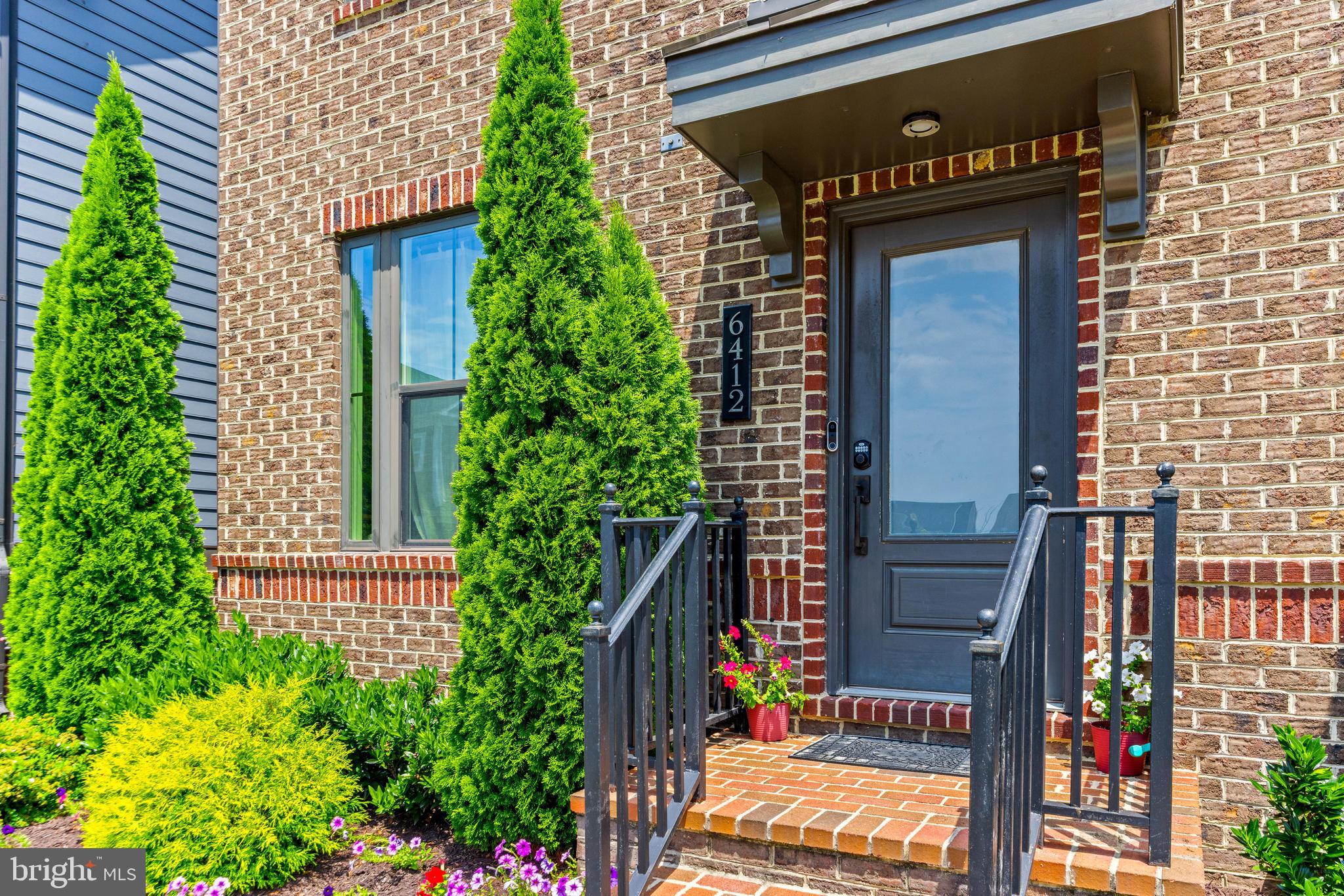 6412 Dalston Street Middle River, MD 21220 - Photo 5 of 53 a couple of potted plants in front of door