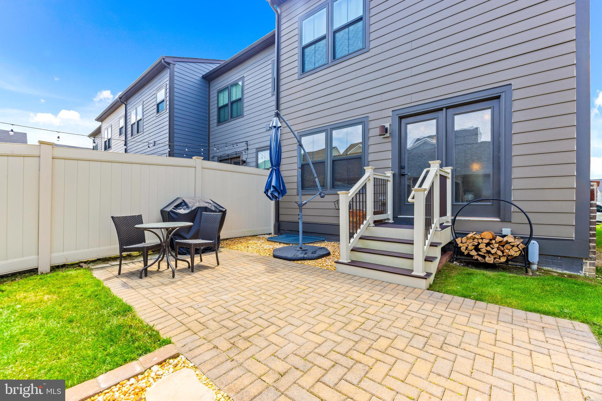 6412 Dalston Street Middle River, MD 21220 - Photo 7 of 53 a view of a chair and tables in the patio in front of the house