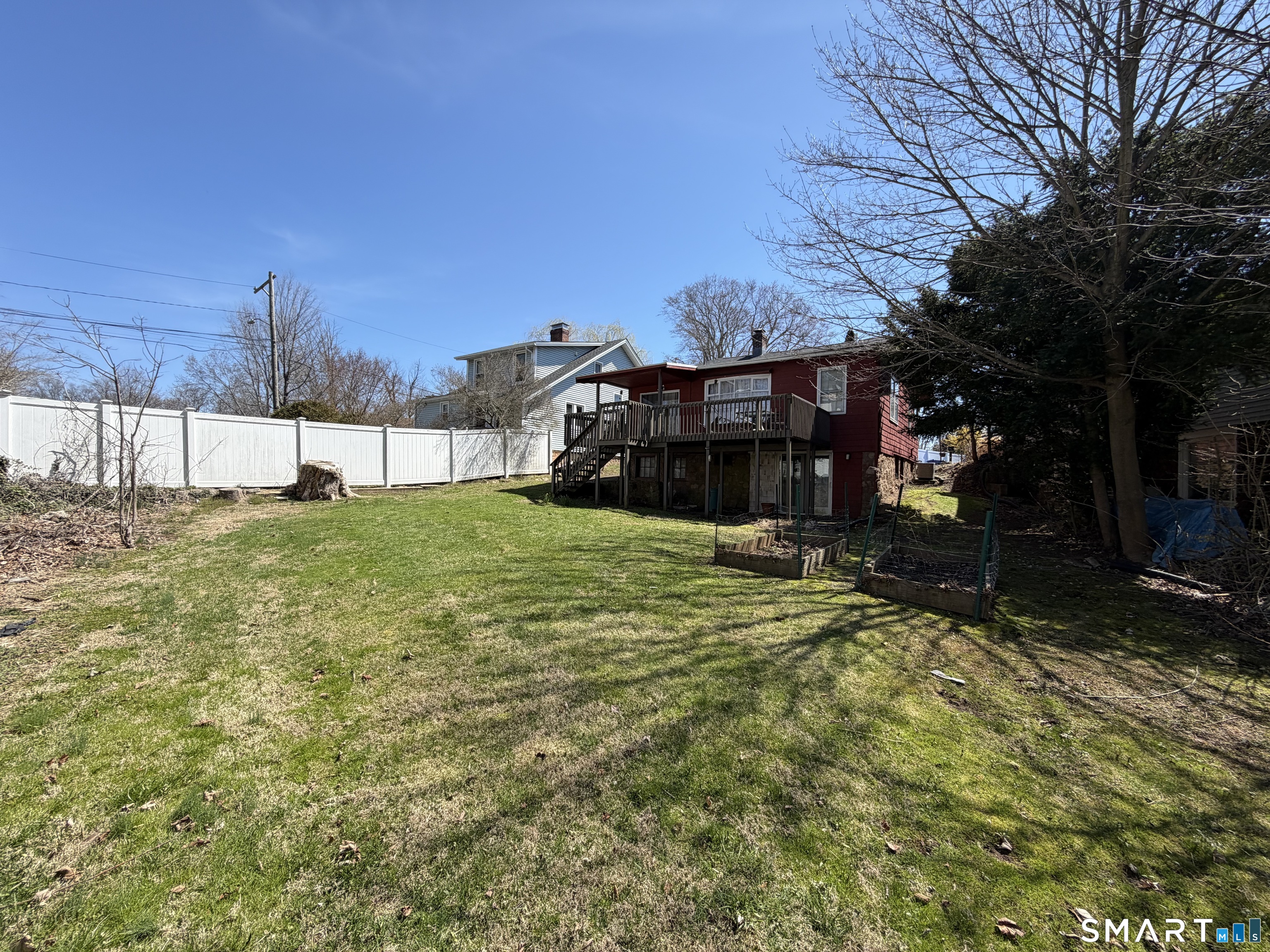 322 Clark Avenue Branford, CT 06405 - Photo 10 of 14 a view of a house with a yard