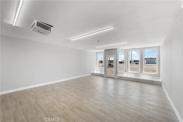a view of an empty room and window