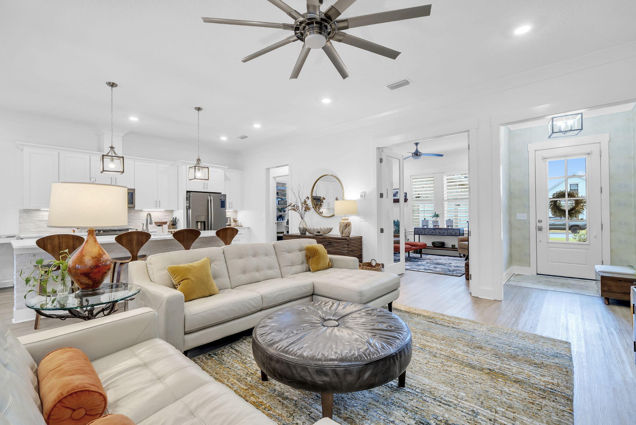 1166 Deer Moss Loop Niceville, FL 32578 - Photo 12 of 46 a living room with furniture and a wooden floor