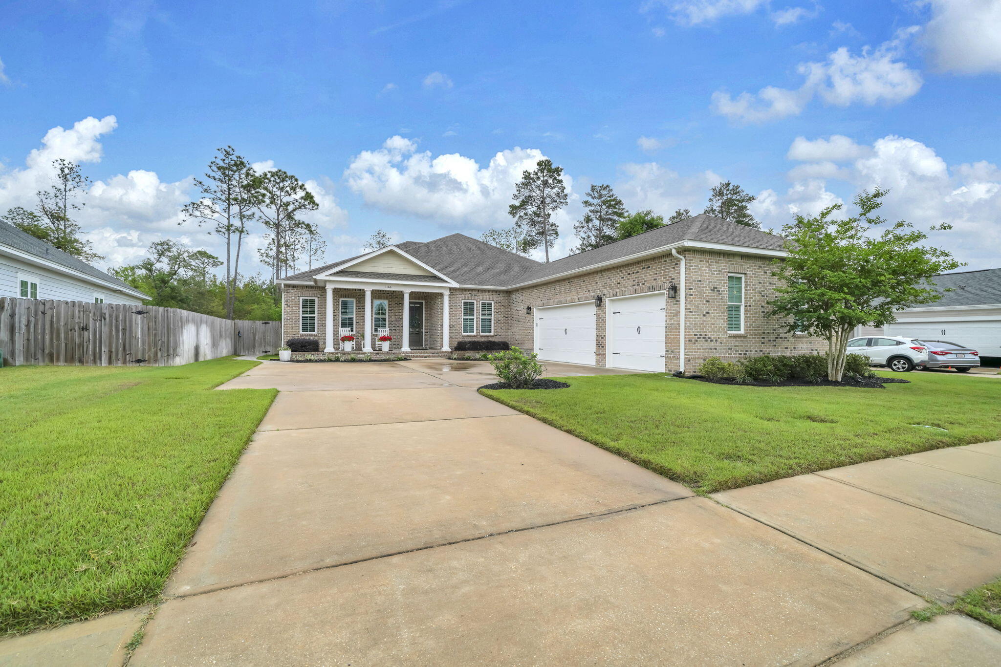 1166 Deer Moss Loop Niceville, FL 32578 - Photo 2 of 46 a view of a house with a yard