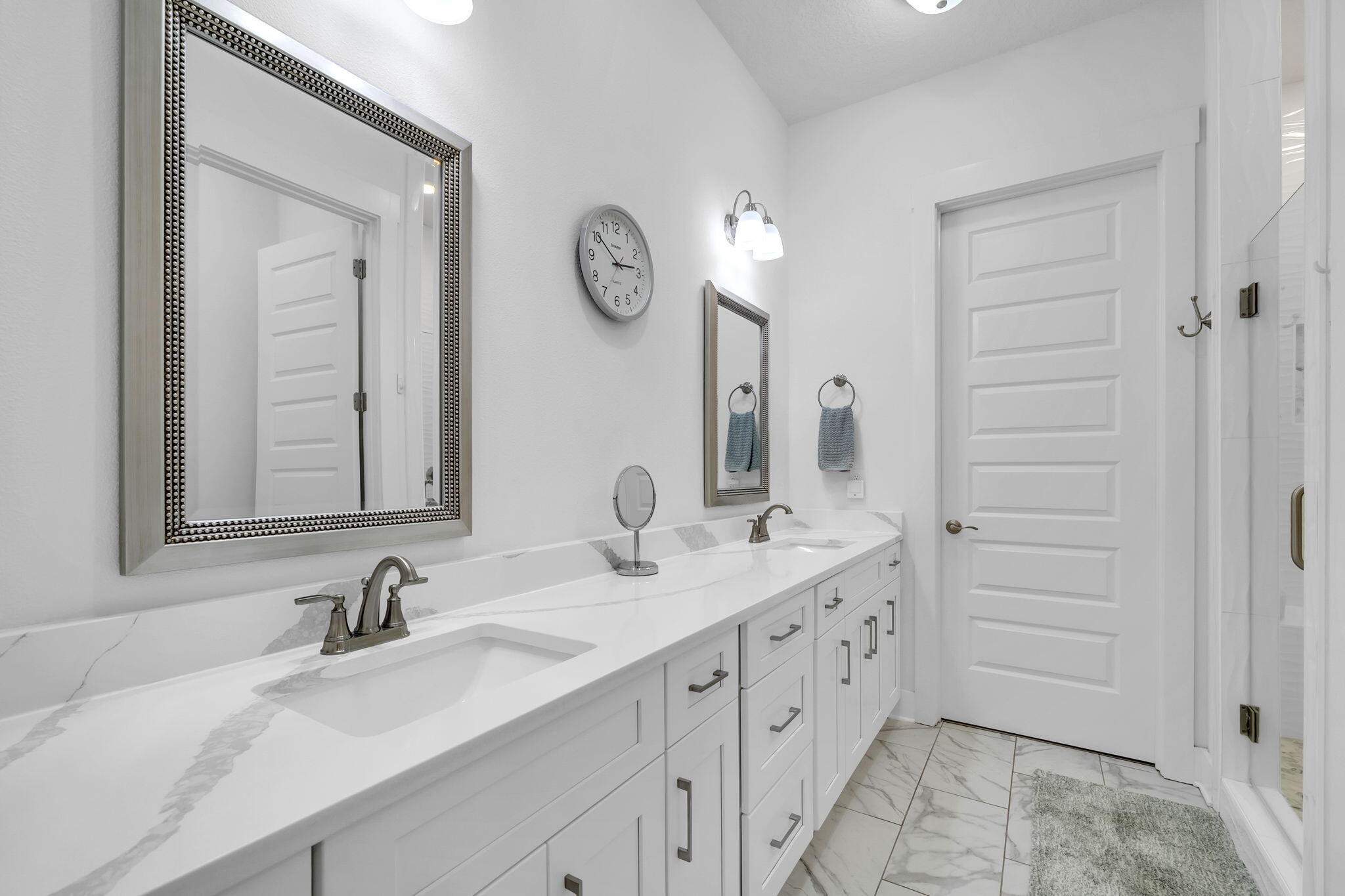 1166 Deer Moss Loop Niceville, FL 32578 - Photo 27 of 46 a bathroom with a double vanity sink and a mirror