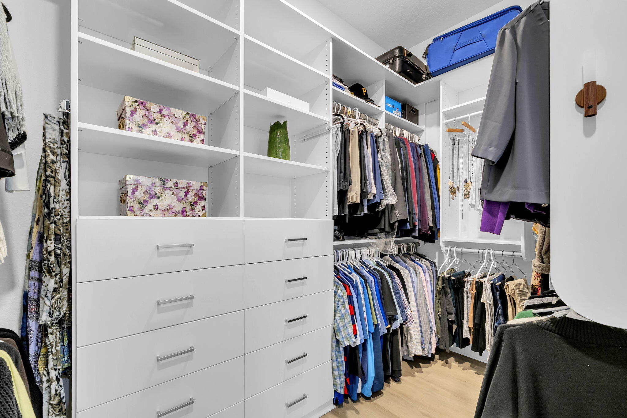 1166 Deer Moss Loop Niceville, FL 32578 - Photo 29 of 46 a view of walk in closet with clothes and shoes