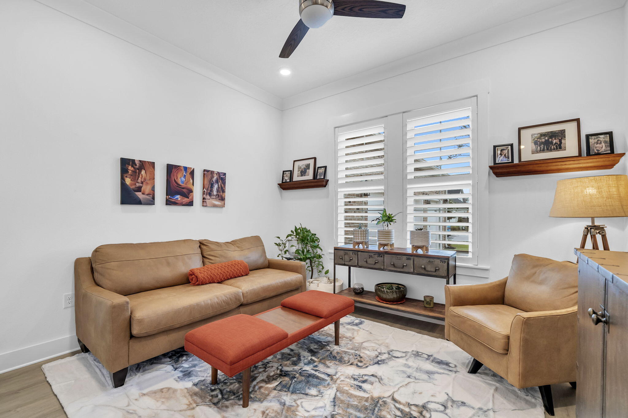 1166 Deer Moss Loop Niceville, FL 32578 - Photo 31 of 46 a living room with furniture a rug and a window